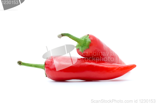 Image of Pair of red hot peppers