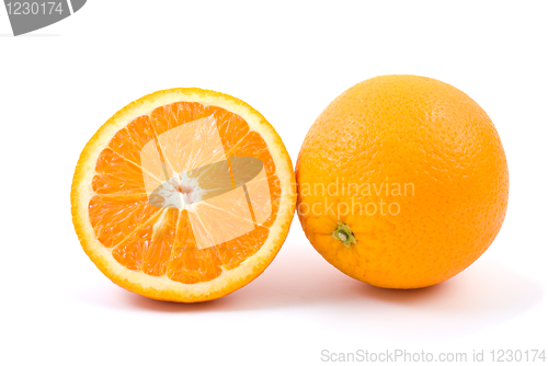 Image of Orange. Whole and half