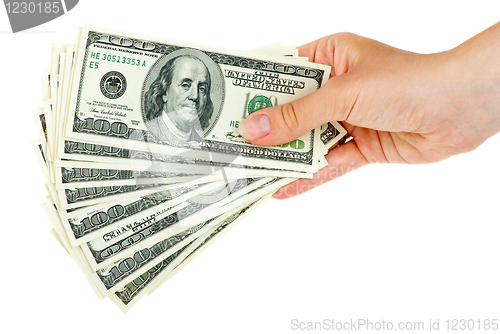 Image of Hand holds bunch of $100 bills