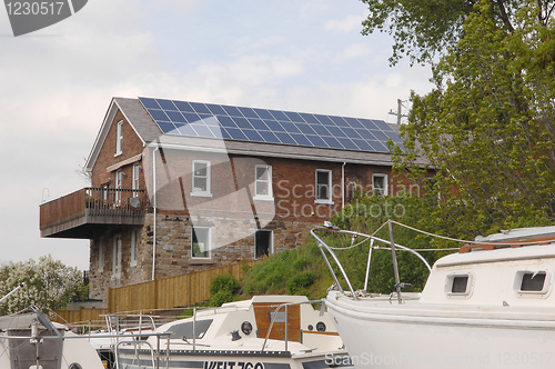 Image of Old house with solar cells.