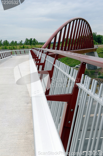 Image of Futuristic pedestrian bridge.