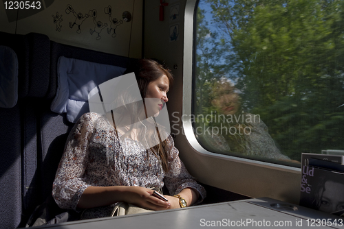 Image of Young girl in train