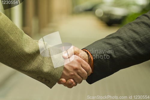 Image of shaking hands