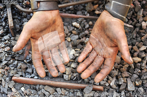 Image of Detail of dirty hands - blacksmith