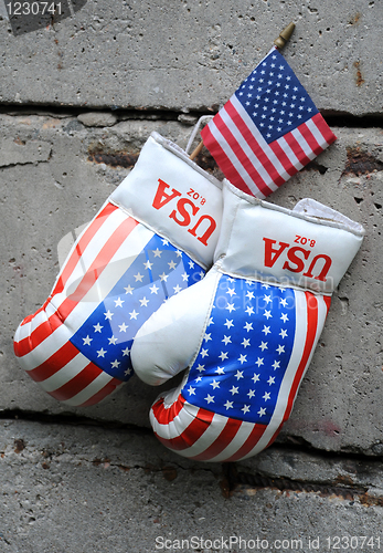 Image of Used Boxing Gloves and US Flag