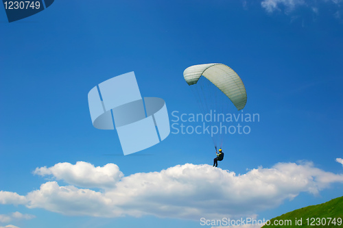 Image of Paraglider on a cloud