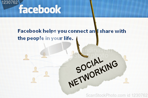 Image of 'SOCIAL NETWORKING', infront of Facebook's main page