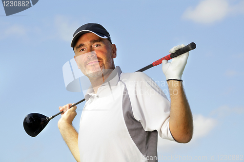 Image of mature golf player 