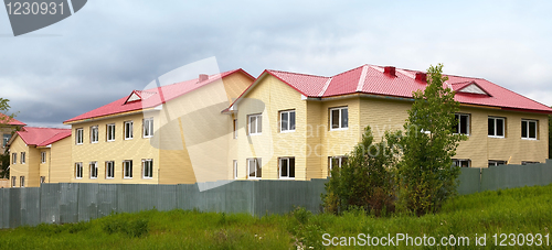 Image of Construction of the house. Finishing work. Facade.