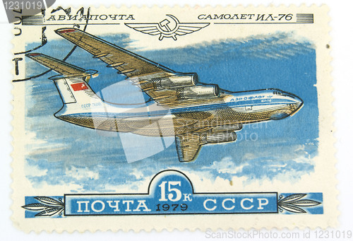 Image of A vintage canselled stamp with a plane