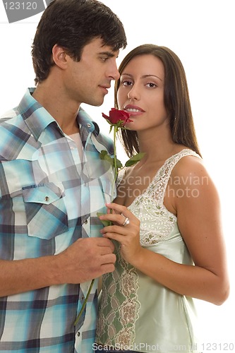 Image of Man Woman holding single red rose