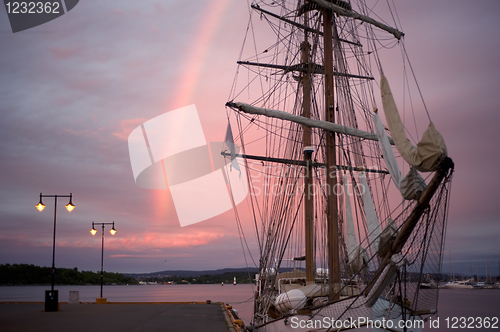 Image of Sailing ship at sunrise