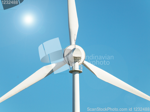 Image of Wind turbine and sun