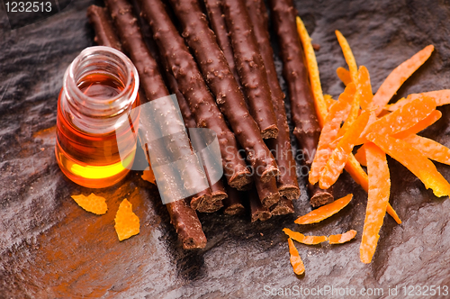 Image of chocolate sticks with orange