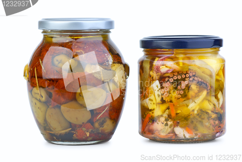 Image of Glass jars with olives and seafood