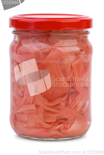 Image of Sliced ginger root marinated in the glass jar