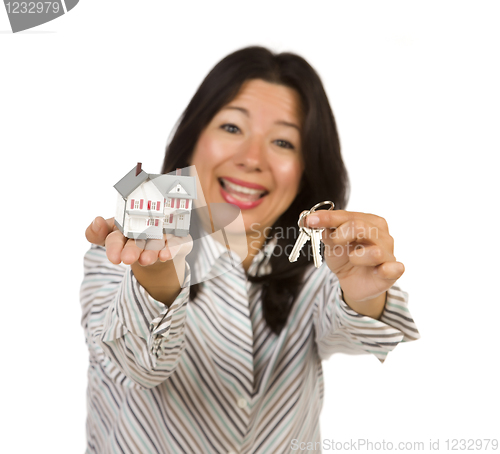 Image of Attractive Multiethnic Woman Holding Small House and Keys