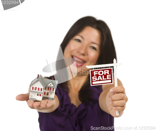 Image of Multiethnic Woman Holding Small For Sale Real Estate Sign and Ho