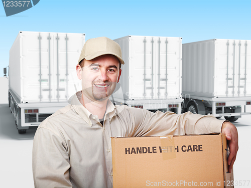 Image of worker with box