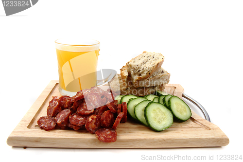 Image of bread, vegetable and sausage