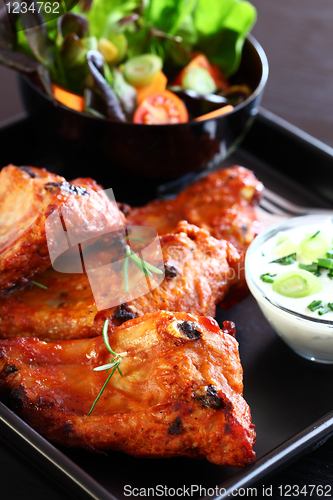 Image of Spare ribs with vegetable salad