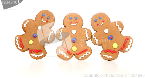 Image of Happy Smiling Gingerbread Figures on White