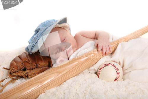 Image of Infant Boy Holding Baseball Bat and Sleeping on a Glove