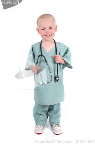 Image of Boy Wearing Scrubs Holding a Stethoscope