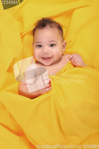 Image of Happy Infant Baby on Yellow Background