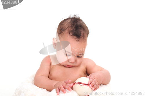 Image of Sweet Infant Boy Gazing at a Baseball
