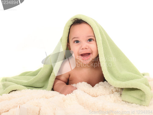 Image of Smiling Boy With a Blanket on His Head