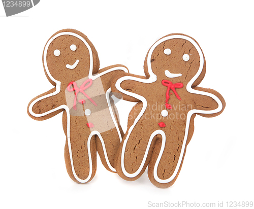 Image of Gingerbread Couple Holding Hands on White Background