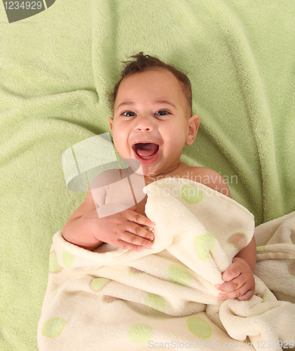 Image of Happy Healthy Baby Boy Lying on His Back