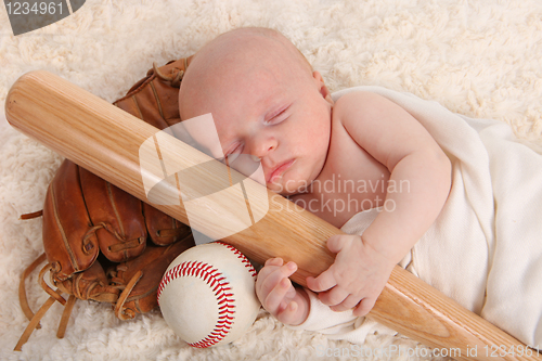 Image of Little Baby Boy Holding a Baseball Bat