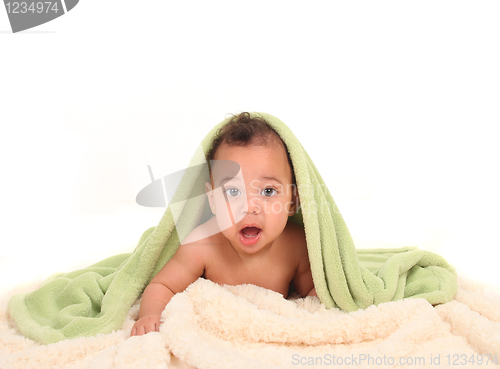 Image of Adorable Baby With Blankets on White Background