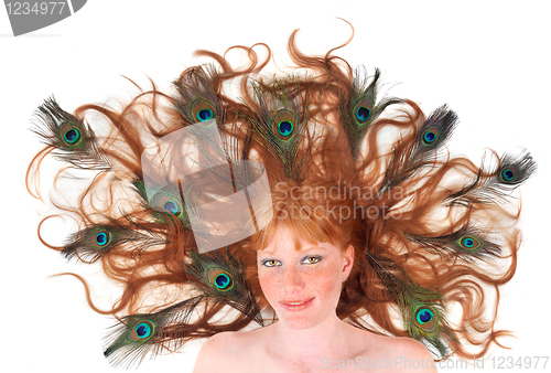 Image of Red Head Woman With Peacock Feathers in Her Hair