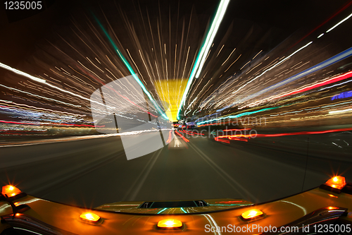 Image of Speed Driving in Los Angeles With Bright City Lights