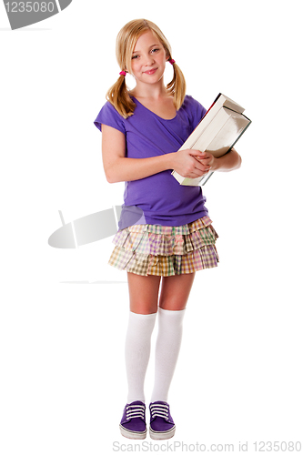Image of Happy school girl with books