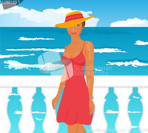 Image of girl on quay at the sea