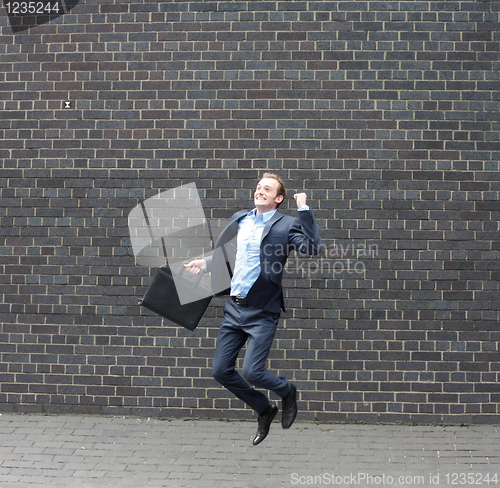 Image of Business man jumping