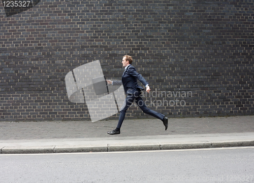 Image of Business man running