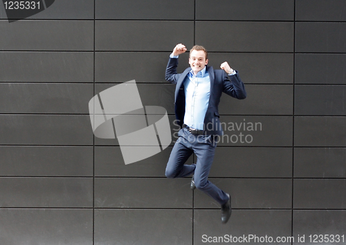 Image of Business man jumping