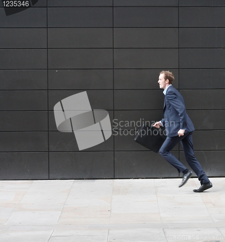 Image of Business man running