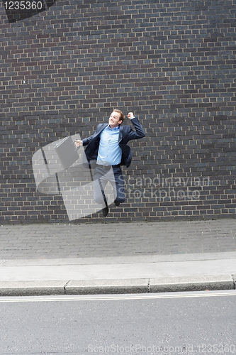 Image of Business man jumping