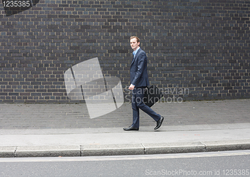 Image of Business man running