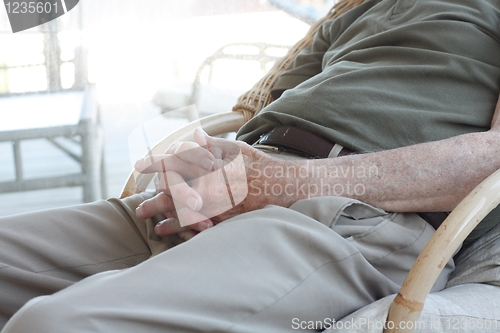 Image of Senior sitting in chair