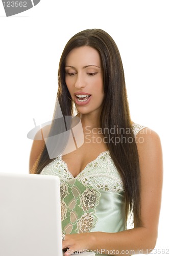 Image of Woman Typing on a Laptop