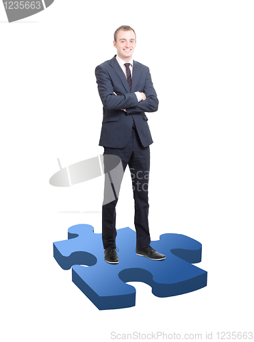 Image of Businessman on puzzle piece