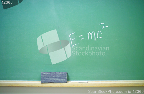 Image of E=mc2 equation on a horizontal chalkboard. (14MP camera)