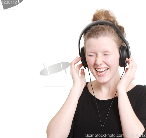 Image of Woman listening to music
